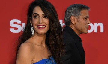Amal Clooney poses for Vogue