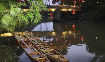 Two Chinese dragon boats capsize in river, 17 killed