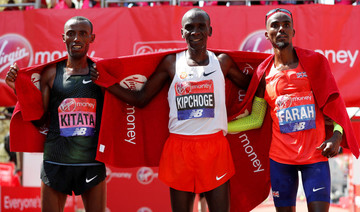 Kenya’s Eliud Kipchoge wins men’s race at London Marathon, Mo Farah third