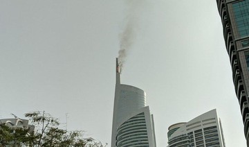 Firefighters tackle blaze in high-rise tower in Dubai