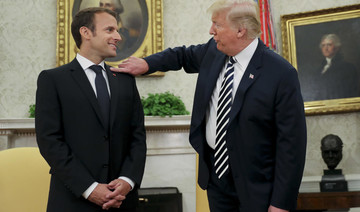 Trump wipes dandruff off visiting French President Macron