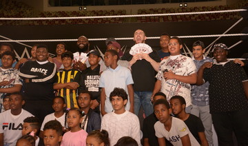 WWE stars soften up to Jeddah children to introduce anti-bullying campaign