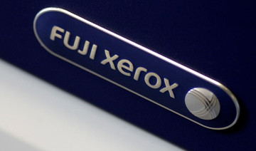 Xerox CEO quits in settlement with shareholders over Fujifilm deal