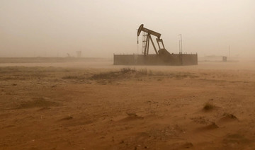 Oil rises on Iran sanction worries, but surging US supplies limit gains