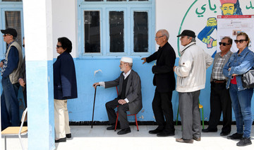 Tunisia’s Ennahda claims victory in landmark local poll