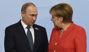 Putin, Merkel reaffirm commitment to Iran nuclear deal