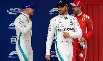 Lewis Hamilton takes pole for Spanish GP with track record