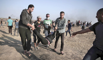 Gazans bury dead after bloodiest day of border protests