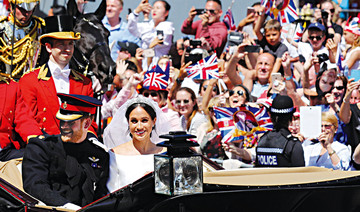 Ancient ritual and modern romance meet as Prince Harry marries Meghan Markle in a dazzling show of pomp and pageantry