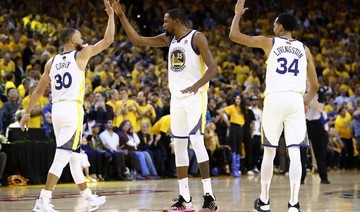 Warriors outlast Cavaliers in overtime to win NBA Finals opener