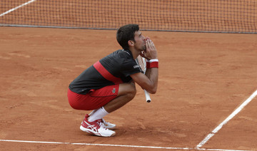 Novak Djokovic stunned by 72nd-ranked Marco Cecchinato at French Open