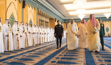 Saudi Arabia's King Salman performs Eid Al-Fitr prayer in Makkah