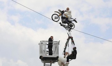 Vows in the air: German couple married in tightrope wedding