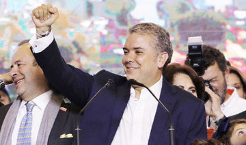Colombia president-elect vows to unite nation, alter peace deal