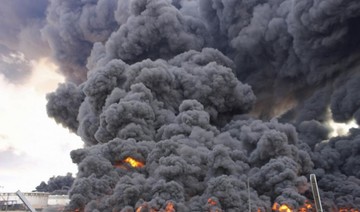 Third oil storage tank at Libya's Ras Lanuf oil terminal set alight during clashes
