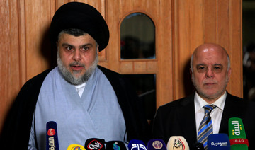 Iraqi PM Abadi and cleric Sadr announce political alliance