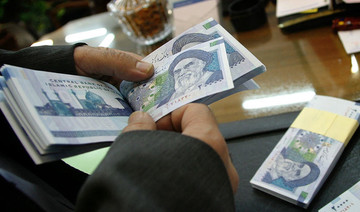 Iran rial plunges to new lows as US sanctions loom