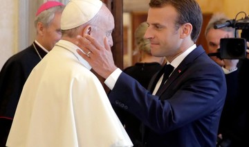 France’s Macron and Pope Francis hold unusually long meeting