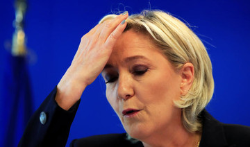 France’s Le Pen says party in mortal danger after funds seized