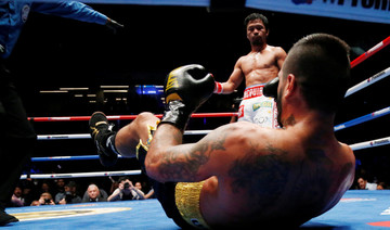 Pacquiao stops Matthysse to win back world title 