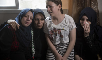 Cease-fire holds after day of intense Israel-Hamas fighting killing 2 teens