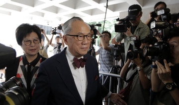Former Hong Kong leader hospitalized after losing appeal for misconduct jailing
