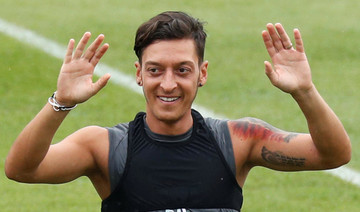 Mesut Ozil avoids talk of Germany retirement on Arsenal’s pre-season tour