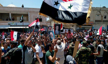 Syrians celebrate retaking town near Israel-occupied Golan