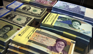 Iran’s currency in free fall as US-imposed sanctions loom