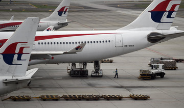MH370 families say no new findings in investigation report, but highlights mistakes