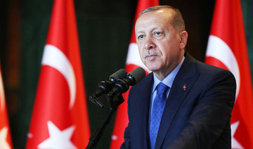Erdogan under pressure as Turkish lira plunges to record low