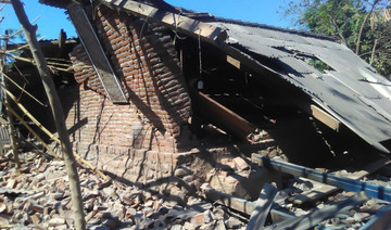 Quake swarm jolts Indonesian islands, killing at least 13