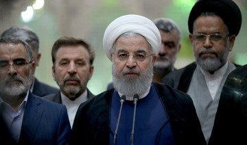 Iran’s Rouhani under attack from all sides