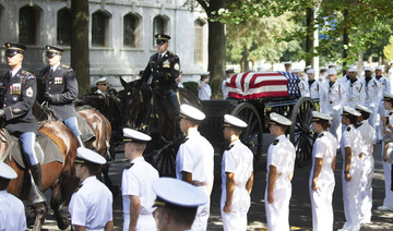 War hero McCain buried at Naval Academy alongside a longtime friend