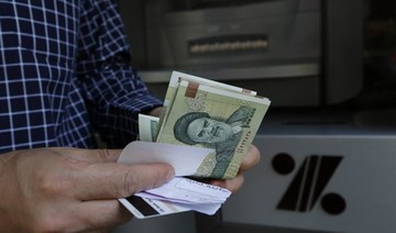 Iranian rial hits record low at 128,000 to the dollar