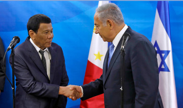 Philippine leader who compared self to Hitler visits Israeli Holocaust memorial