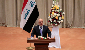 Iraq’s top two parliament groups urge PM to resign