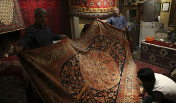 Unease, anger in Tehran's Grand Bazaar, Iran's beating heart