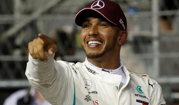Lewis Hamilton produces ‘magic’ lap to take Singapore pole
