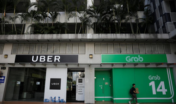 Singapore competition watchdog fines Grab, Uber $9.5 million over merger