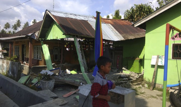 Tsunami sweeps away homes on Indonesian island of Sulawesi