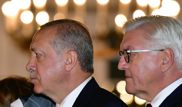 Turkey’s Erdogan, in Berlin, pledges EU visa push