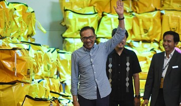 Malaysia’s Anwar returns to frontline politics in big poll win