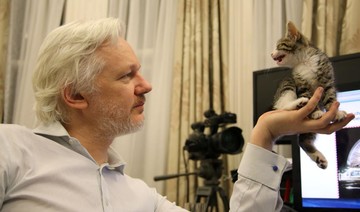 Ecuador tells Assange to curb speech, look after cat