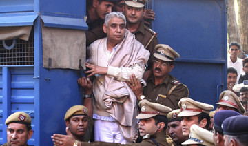 Indian court gives life sentence to guru, 14 followers