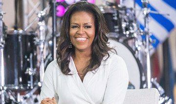 Michelle Obama had miscarriage, used IVF to conceive girls