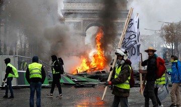 Paris police clash with ‘yellow vest’ protesters, Saudi embassy cautions citizens