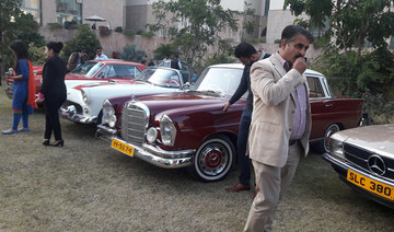 Vintage car owners on a drive to promote a softer image of Pakistan