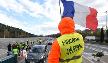Paris cleans up after latest riot; pressure builds on Macron