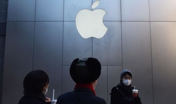 Apple China says it will push software update in bid to resolve Qualcomm case